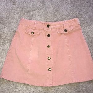 Salmon pink denim skirt.